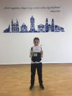 Horváth Márton 2. b osztályos tanuló Szombathelyen vett részt a megyei szépolvasási versenyen